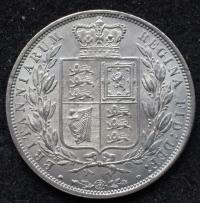 An Extremely Choice Victorian Young Head Halfcrown of 1883 with satin surfaces and a crisp strike.
