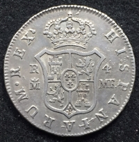 A CHOICE & RARE SPANISH (MEXICO MINT) FOUR REALES
of 1796 (A Very Scarce Date) in AEF Condition. Struck During the Yellow Fever Epidemic of 1796, in the year of the 2nd Treaty of San Ildefonso (The 2nd Franco-Spanish Alliance)