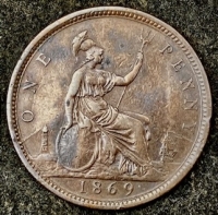 AN OUTSTANDING & VERY RARE BRONZE PENNY OF 1869
(The “Key Date” of the Series) In Original GVF Condition with excellent surfaces and interesting mid-stage die cracks on reverse.