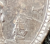 AN OUTSTANDING & VERY RARE BRONZE PENNY OF 1869
(The “Key Date” of the Series) In Original GVF Condition with excellent surfaces and interesting mid-stage die cracks on reverse.